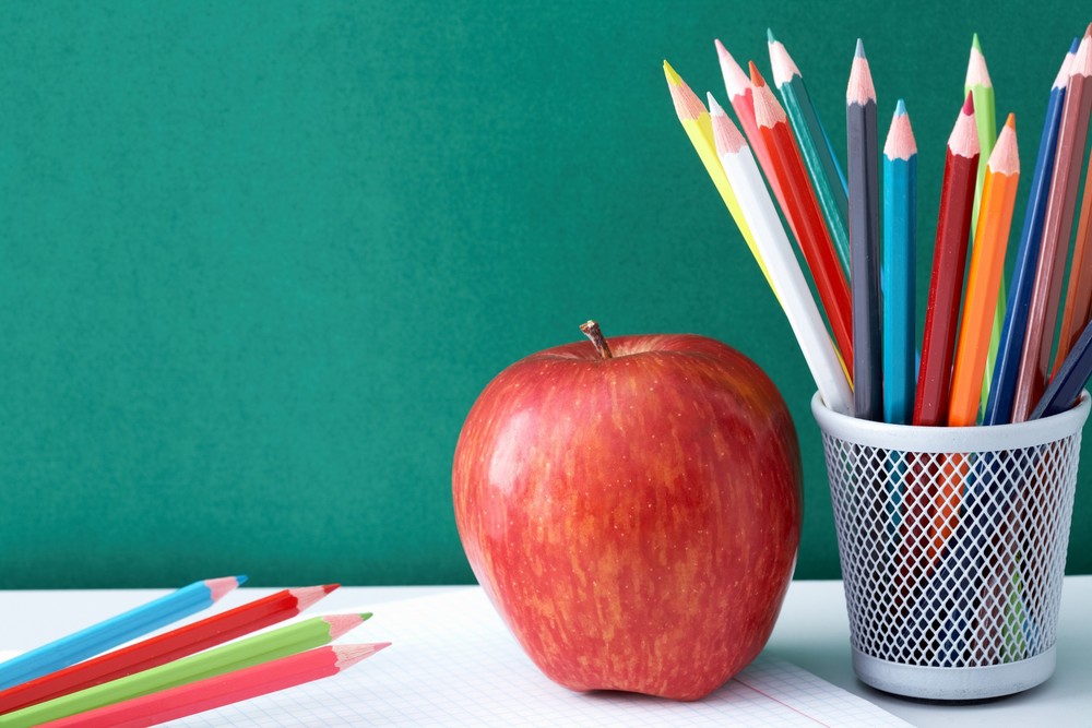 pencils and an apple